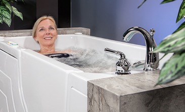 Advantages of a walk-in tub over a conventional tub